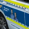 Seitenansicht eines Streifenwagens mit Nachwuchswerbung der Polizei Brandenburg